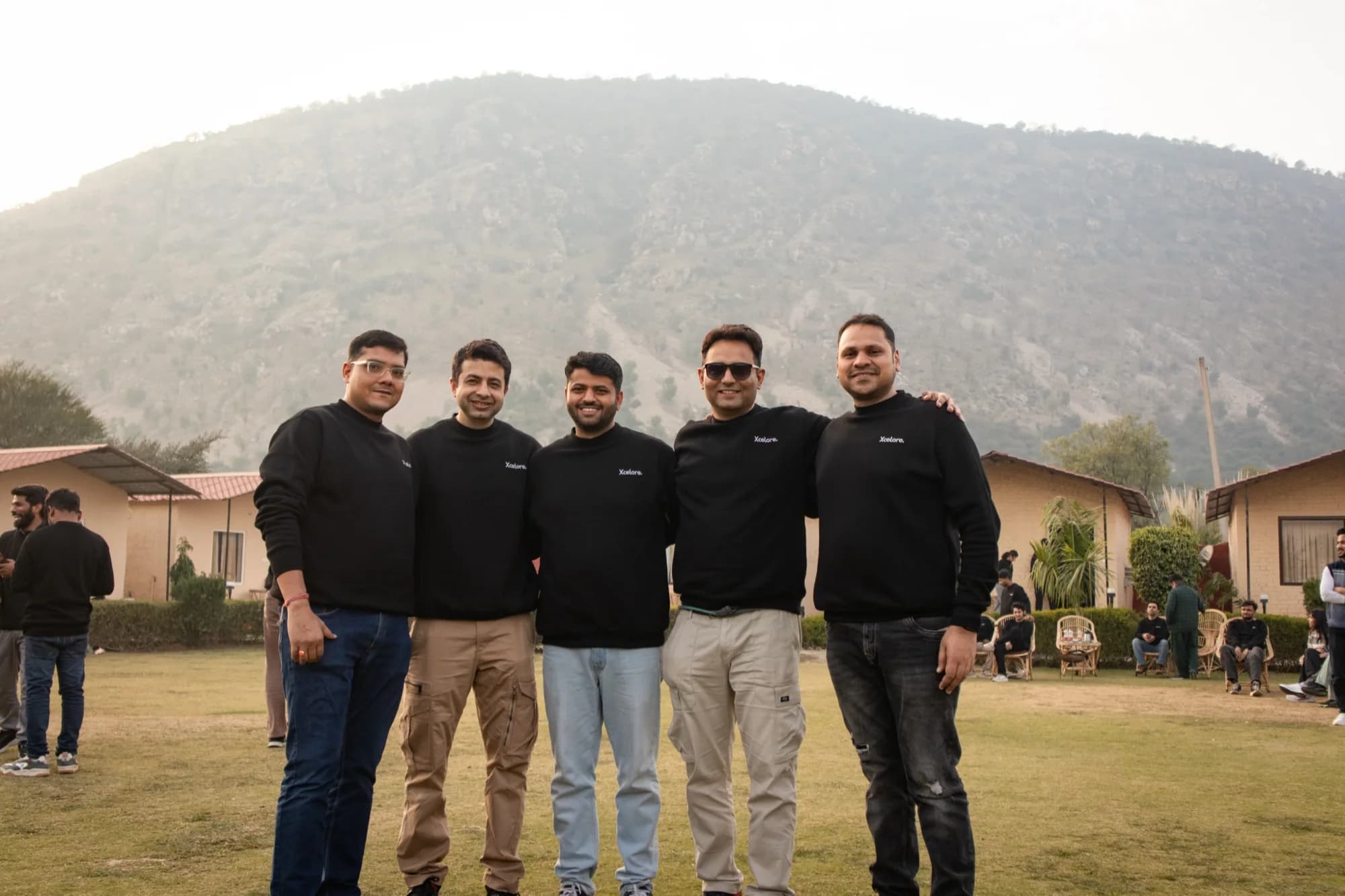 The Xcelore leadership team together outdoors